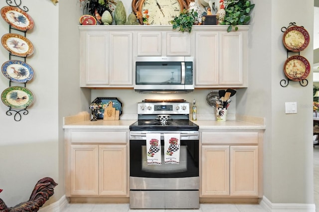 67 Lagare St, Palm Coast, FL 32137 - kitchen featuring stainless steel appliances and light countertops