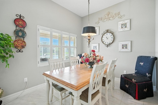 67 Lagare St, Palm Coast, FL 32137 - dining space featuring baseboards and light tile patterned flooring