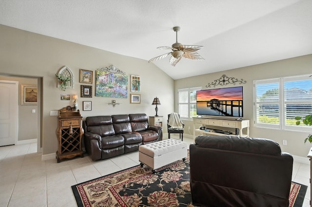 67 Lagare St, Palm Coast, FL 32137 - living area with light tile patterned floors, ceiling fan, and lofted ceiling