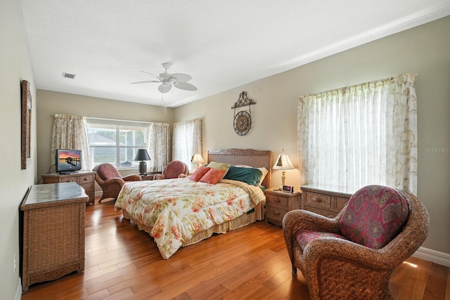 67 Lagare St, Palm Coast, FL 32137 - bedroom featuring light wood-style flooring and a ceiling fan