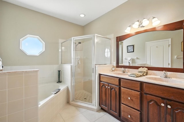 67 Lagare St, Palm Coast, FL 32137 - bathroom featuring tile patterned floors, a shower stall, double vanity, and a bath