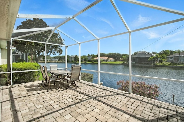 67 Lagare St, Palm Coast, FL 32137 - unfurnished sunroom with a water view and outdoor dining area