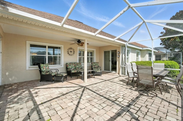 67 Lagare St, Palm Coast, FL 32137 - view of patio / terrace featuring a ceiling fan, glass enclosure, and outdoor dining area