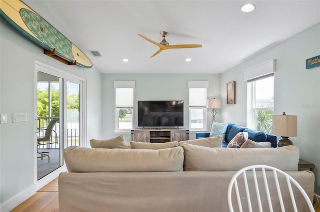 19 Bay Dr, Palm Coast, FL 32137 - living room with healthy amount of natural light, a ceiling fan, light wood-type flooring, and recessed lighting