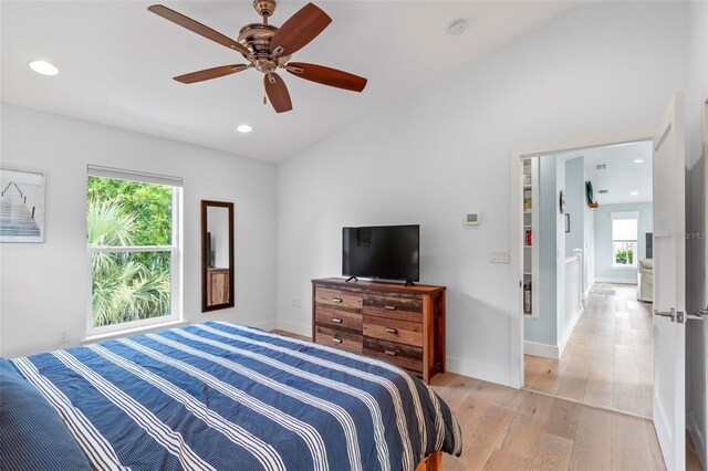 19 Bay Dr, Palm Coast, FL 32137 - bedroom featuring light wood-style flooring, recessed lighting, a ceiling fan, and vaulted ceiling