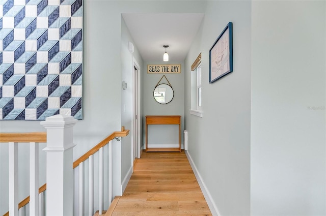 19 Bay Dr, Palm Coast, FL 32137 - hallway with an upstairs landing and light wood-style flooring