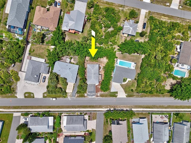 19 Bay Dr, Palm Coast, FL 32137 - aerial view of property and surrounding area with nearby suburban area