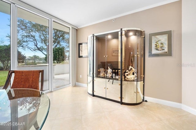 231 Riverside Dr Unit 103-1, Daytona Beach, FL 32117 - interior space with crown molding, tile patterned floors, and a wall of windows