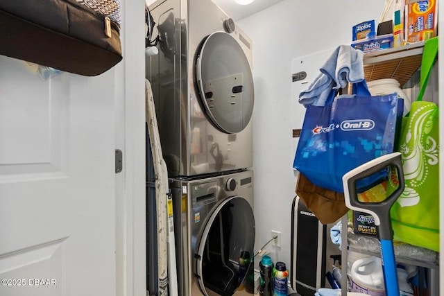 231 Riverside Dr Unit 103-1, Daytona Beach, FL 32117 - laundry area with stacked washer / drying machine