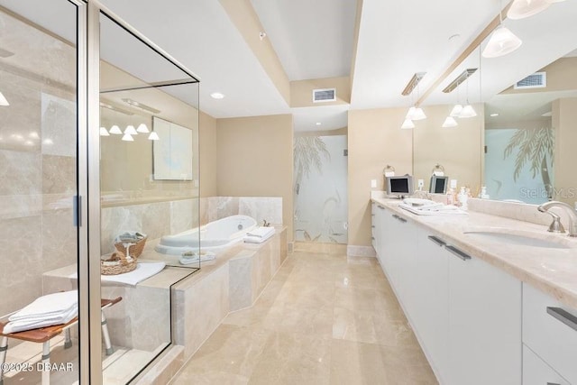 231 Riverside Dr Unit 103-1, Daytona Beach, FL 32117 - bathroom featuring a bath, double vanity, walk in shower, and recessed lighting