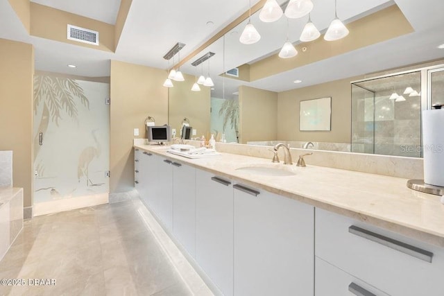 231 Riverside Dr Unit 103-1, Daytona Beach, FL 32117 - full bath featuring a shower stall and double vanity