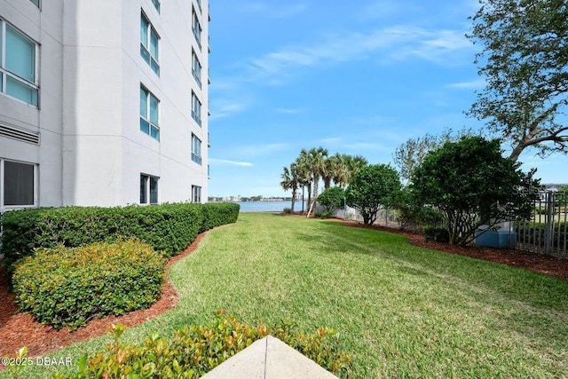 231 Riverside Dr Unit 103-1, Daytona Beach, FL 32117 - view of green lawn featuring a water view