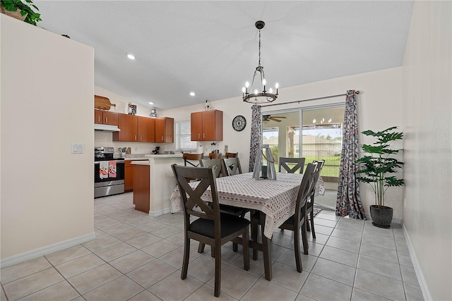 54 Pine Grove Dr, Palm Coast, FL 32164 - dining space featuring a chandelier, light tile patterned floors, and recessed lighting