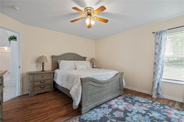 54 Pine Grove Dr, Palm Coast, FL 32164 - bedroom featuring wood finished floors and a ceiling fan