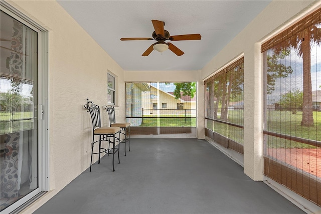 54 Pine Grove Dr, Palm Coast, FL 32164 - sunroom / solarium featuring a ceiling fan