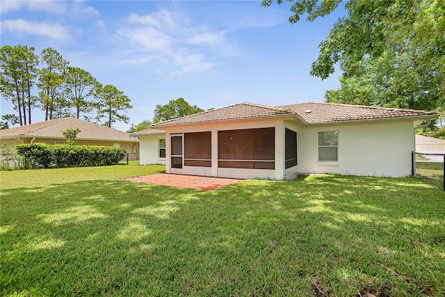54 Pine Grove Dr, Palm Coast, FL 32164 - back of house featuring a tile roof, stucco siding, a sunroom, and a patio