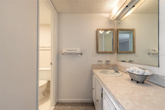 3047 S Atlantic Ave Unit 706, Daytona Beach, FL 32118 - bathroom featuring a textured ceiling and vanity
