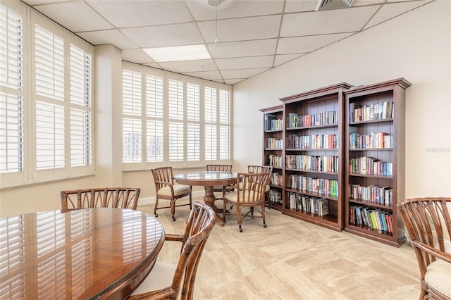 3047 S Atlantic Ave Unit 706, Daytona Beach, FL 32118 - dining space featuring a drop ceiling