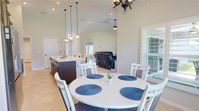 90 Randolph Dr, Palm Coast, FL 32164 - dining space featuring a ceiling fan, high vaulted ceiling, light tile patterned flooring, and recessed lighting