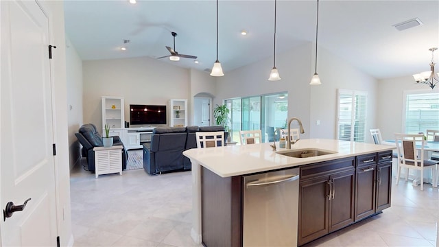 90 Randolph Dr, Palm Coast, FL 32164 - kitchen with stainless steel dishwasher, ceiling fan, light countertops, a chandelier, and hanging light fixtures