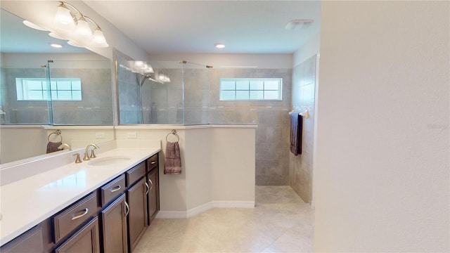 90 Randolph Dr, Palm Coast, FL 32164 - bathroom with vanity, walk in shower, healthy amount of natural light, and recessed lighting