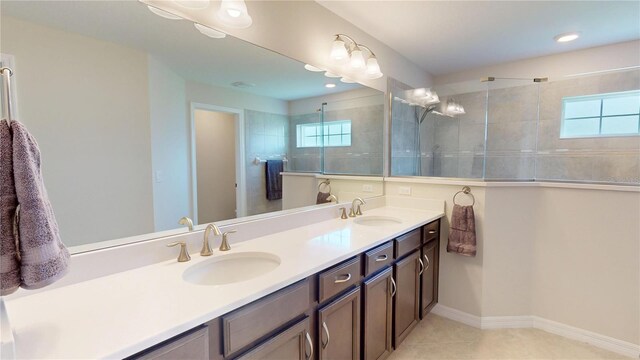 90 Randolph Dr, Palm Coast, FL 32164 - full bath featuring double vanity, tile patterned floors, and tiled shower