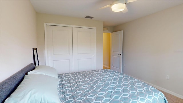 90 Randolph Dr, Palm Coast, FL 32164 - carpeted bedroom featuring a closet and a ceiling fan