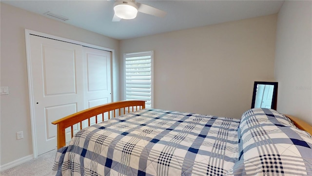 90 Randolph Dr, Palm Coast, FL 32164 - bedroom featuring light colored carpet, a closet, and ceiling fan
