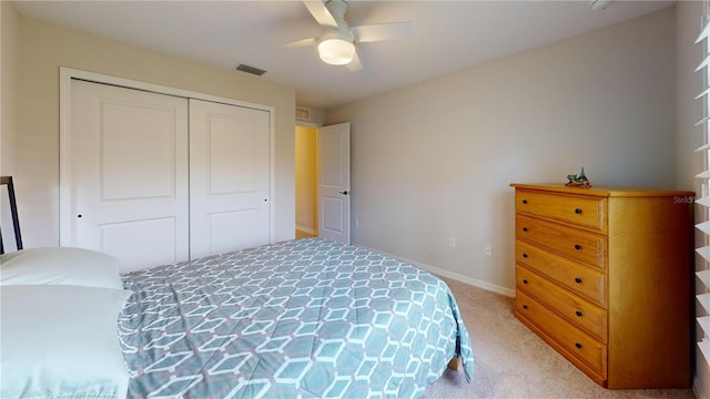 90 Randolph Dr, Palm Coast, FL 32164 - bedroom with light carpet, a closet, and a ceiling fan