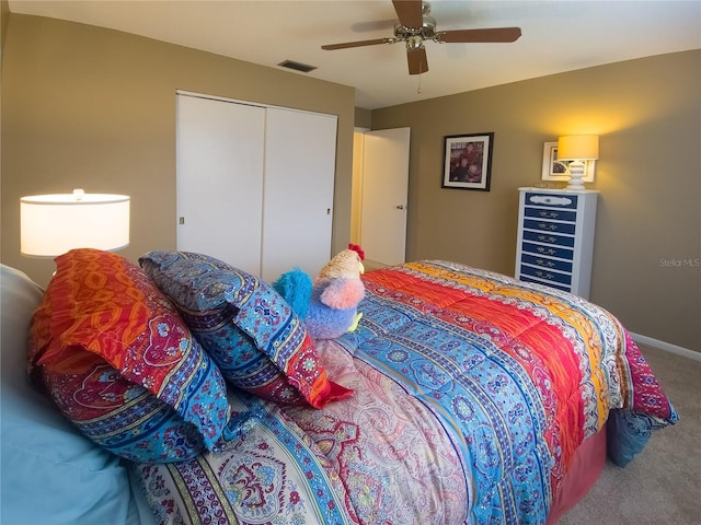 9 Collins Ln, Palm Coast, FL 32137 - carpeted bedroom featuring a closet and ceiling fan