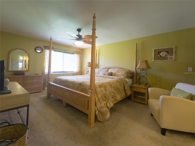 9 Collins Ln, Palm Coast, FL 32137 - bedroom featuring light colored carpet and ceiling fan
