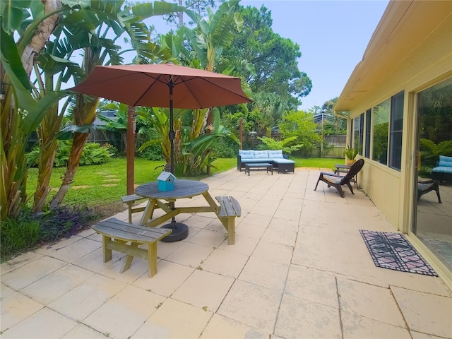 9 Collins Ln, Palm Coast, FL 32137 - fenced backyard with outdoor lounge area and a patio