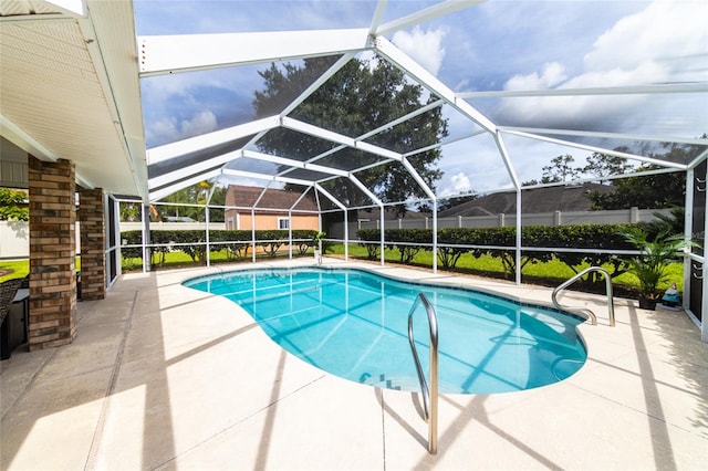 4 Essington Ln, Palm Coast, FL 32164 - view of pool featuring a patio area and glass enclosure