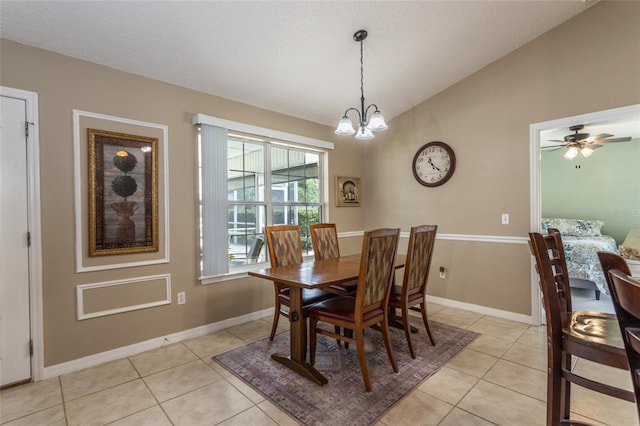 4 Essington Ln, Palm Coast, FL 32164 - dining area featuring light tile patterned floors, a chandelier, lofted ceiling, and ceiling fan