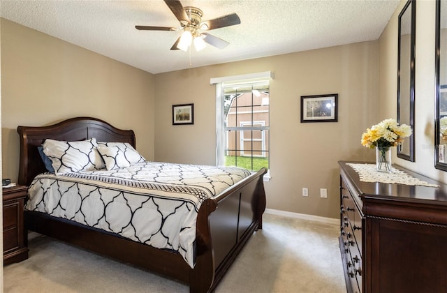 4 Essington Ln, Palm Coast, FL 32164 - bedroom with light carpet, a textured ceiling, and ceiling fan