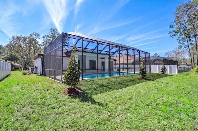 179 Eric Dr, Palm Coast, FL 32164 - back of house featuring a lanai
