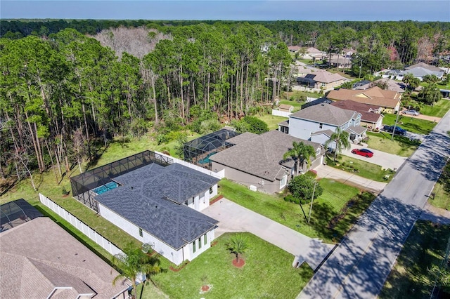 179 Eric Dr, Palm Coast, FL 32164 - aerial view of residential area with a forest