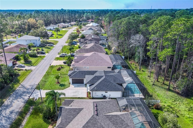 179 Eric Dr, Palm Coast, FL 32164 - aerial perspective of suburban area with a forest