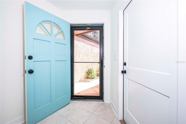 3630 S Central Ave, Flagler Beach, FL 32136 - entrance foyer with baseboards and light tile patterned floors