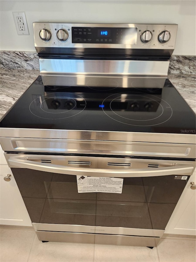 3630 S Central Ave, Flagler Beach, FL 32136 - detailed view of electric range and light countertops