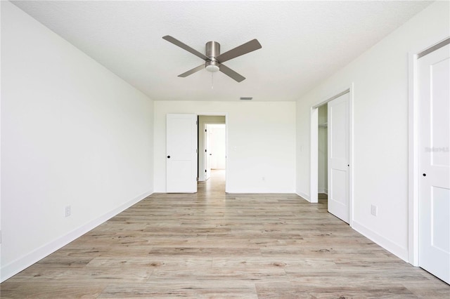 3630 S Central Ave, Flagler Beach, FL 32136 - spare room with a ceiling fan and light wood-style floors