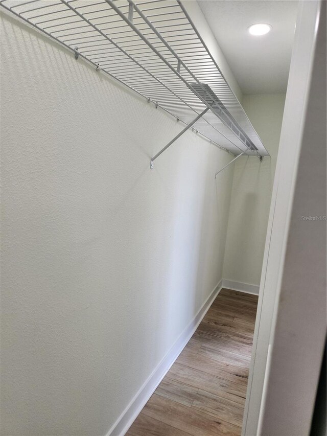 3630 S Central Ave, Flagler Beach, FL 32136 - walk in closet with wood finished floors