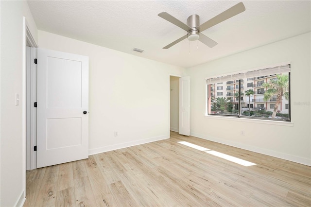 3630 S Central Ave, Flagler Beach, FL 32136 - unfurnished room featuring light wood finished floors and ceiling fan
