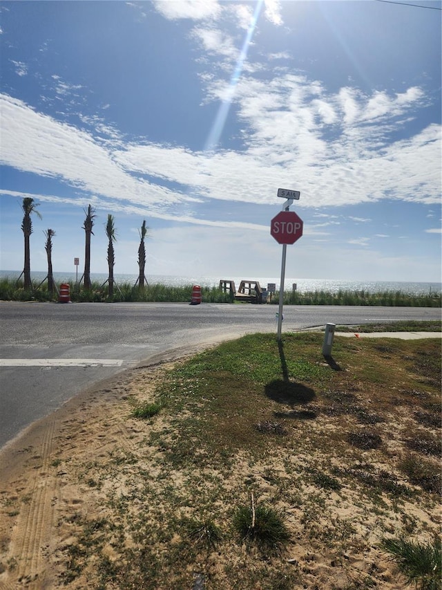 3630 S Central Ave, Flagler Beach, FL 32136 - view of asphalt road with traffic signs