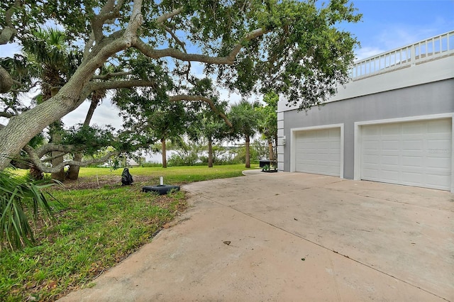 101 N 22nd St, Flagler Beach, FL 32136 - view of yard featuring a garage
