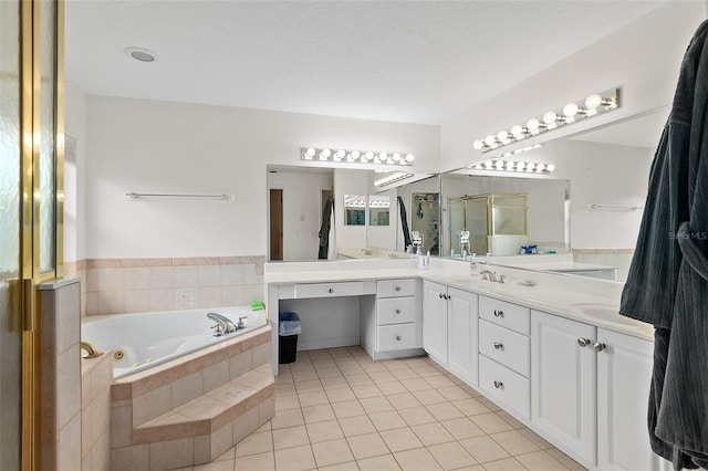 101 N 22nd St, Flagler Beach, FL 32136 - full bathroom with a whirlpool tub, tile patterned floors, double vanity, and a stall shower