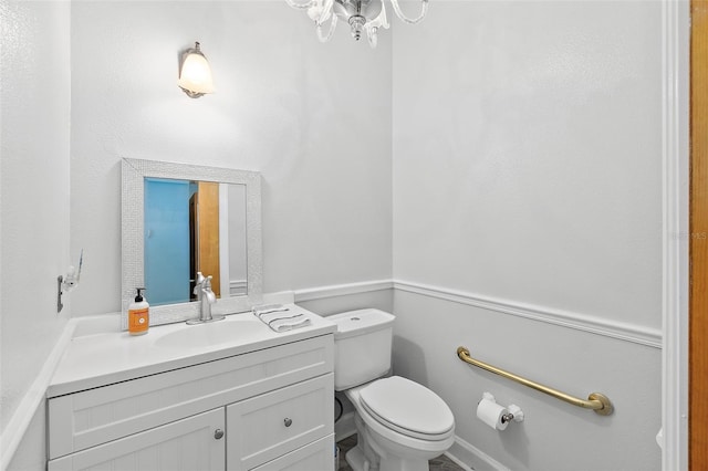 101 N 22nd St, Flagler Beach, FL 32136 - bathroom featuring vanity and a chandelier