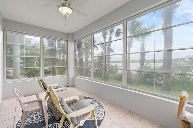 101 N 22nd St, Flagler Beach, FL 32136 - sunroom featuring tile patterned flooring and a water view
