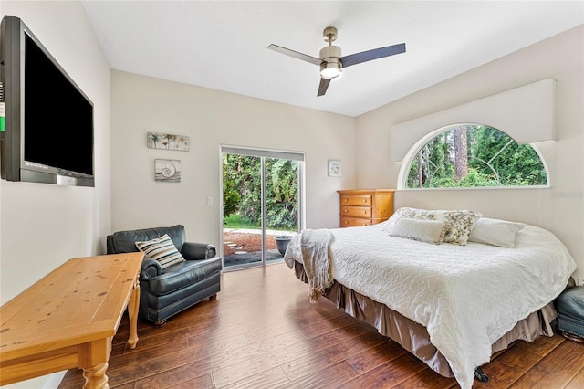 68 Egret Trl, Palm Coast, FL 32164 - bedroom featuring multiple windows, access to outside, and wood-type flooring