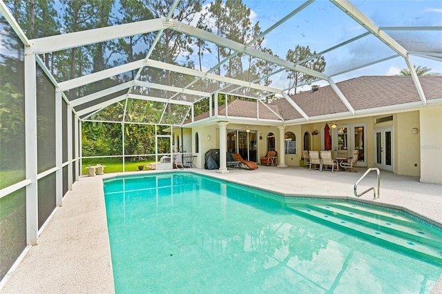 68 Egret Trl, Palm Coast, FL 32164 - swimming pool featuring french doors, ceiling fan, a patio, and a lanai